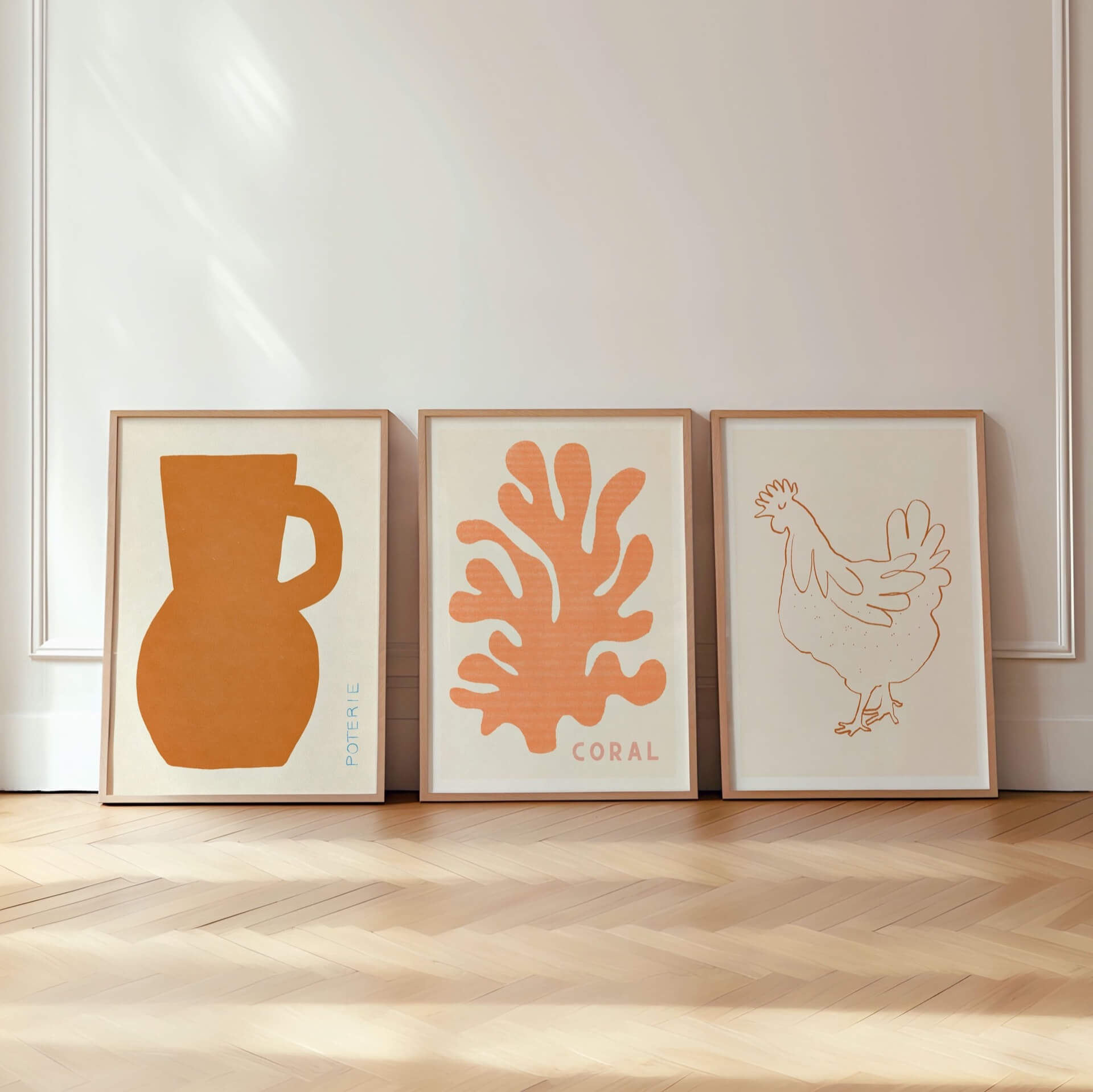 three fine art prints in pine wood frame against vintage panel wall