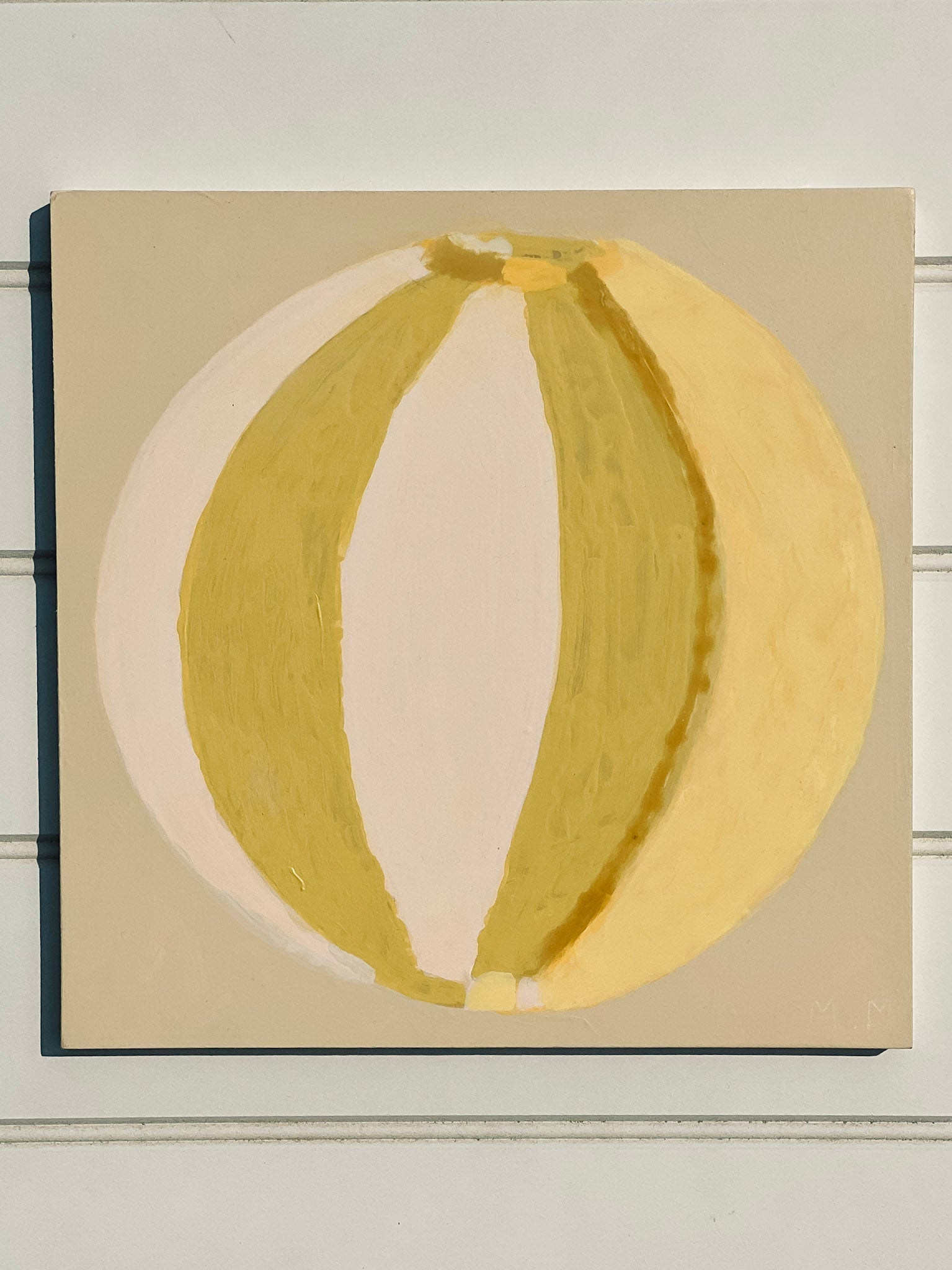 Green, cream, yellow abstract painting of summer beach ball on reinforced plywood panel by contemporary Cornwall Artist Mila May.