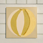 Green, cream, yellow abstract painting of summer beach ball on reinforced plywood panel by contemporary Cornwall Artist Mila May.