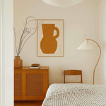 french pottery fine art print in mediterranean bedroom in thin wood frame on plaster pink wall