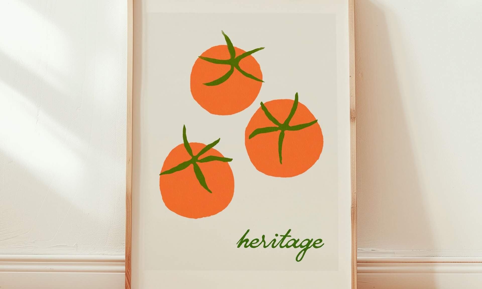 colourful stylish red tomato art print framed in warm sunny room