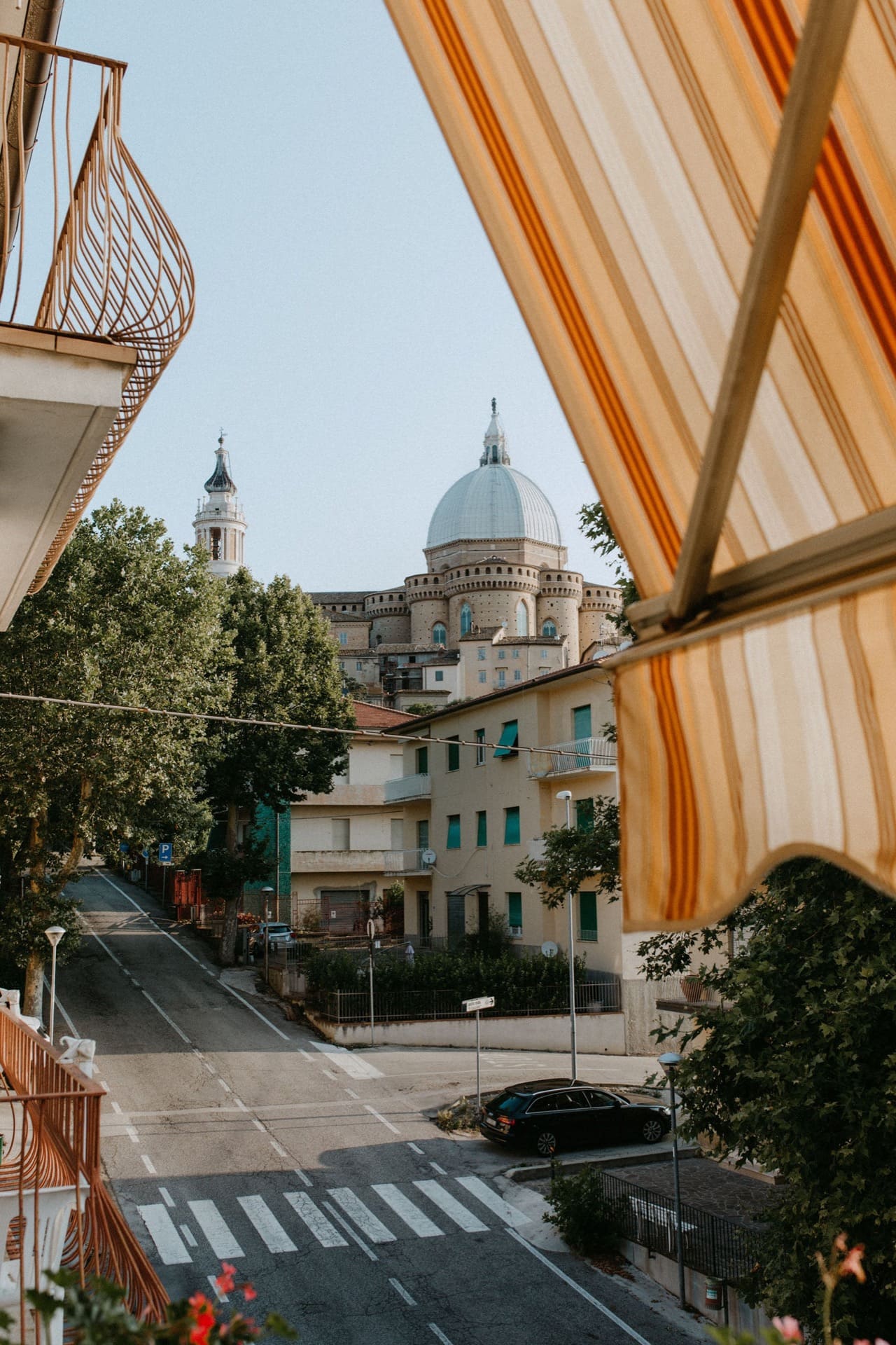 beach stripe awning above restaurant and luxury boutique hotel in florence italy