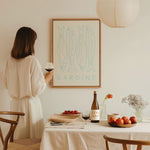 sardine fish art print in large floating frame in dining room by wine
